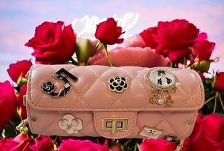 Coco-Inspired Quilted Handbags with Iconic Charms
