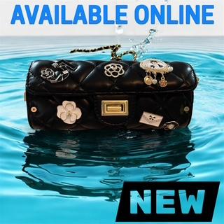 Coco-Inspired Quilted Handbags with Iconic Charms