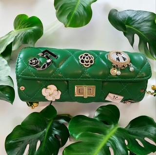 Coco-Inspired Quilted Handbags with Iconic Charms